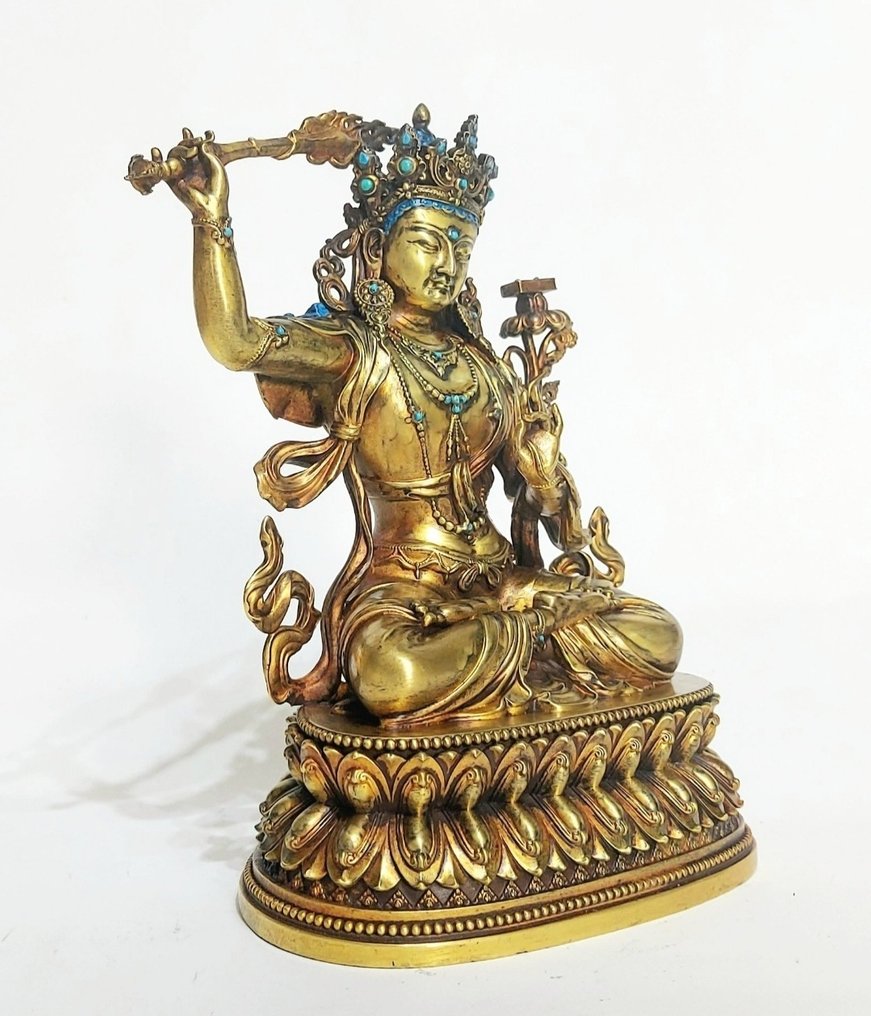 07. Mañjushri, Mañjuśrī, Mañjughoṣa, Mañjusvara, Manjuvajra, Pañcaśikha, Yamantaka or Mañjuśrīkumārabhūta. One of the Four Outer Offering Bodhisattvas.